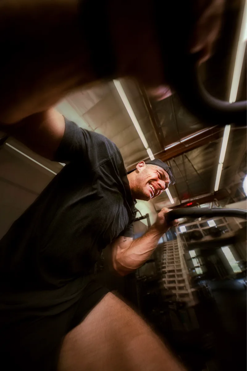 An athlete on the AssaultBike